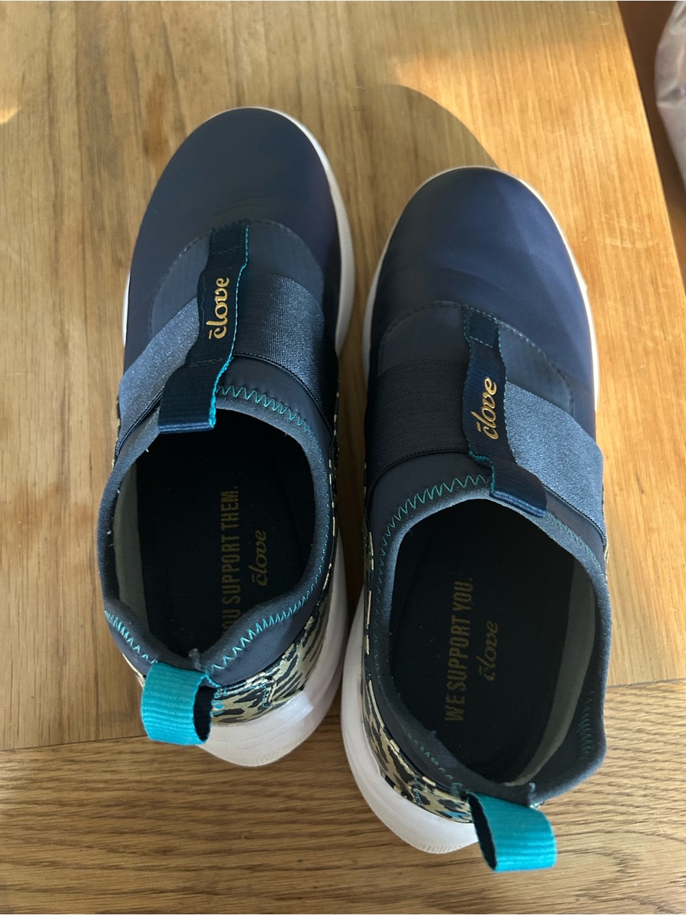 Clove Women's Navy Slip-On Sneakers with Teal Trim